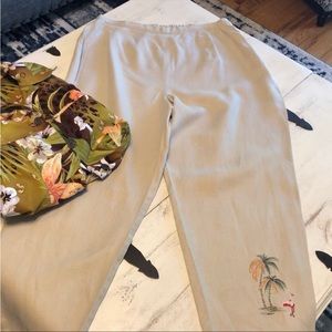 DRESSBARN linen pants with embroidered design on left leg.